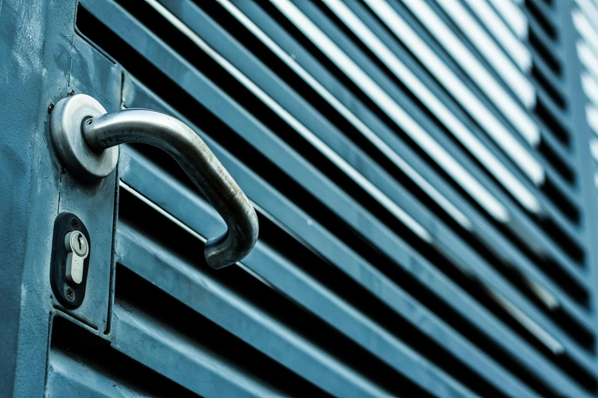 Commercial locksmith repairing business lock in Volusia County