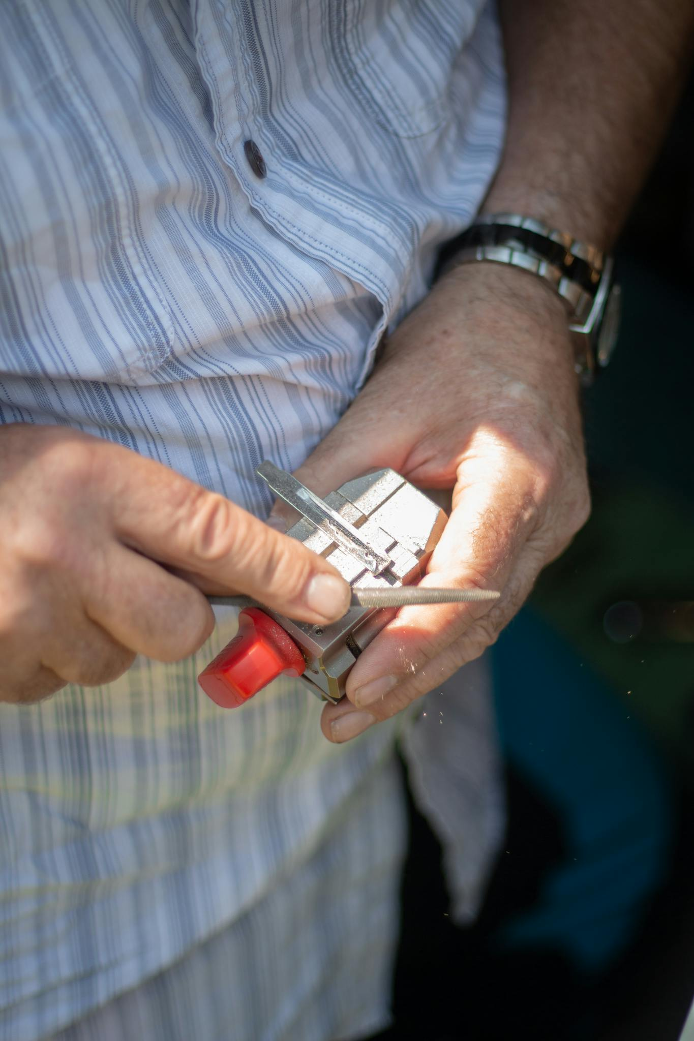 Blank house key prepared for cutting by locksmith